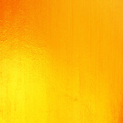 Gold paint on cement wall texture