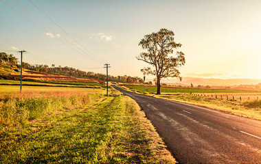 Scenes of the countryside road in Queensland in the golden hours of the sunset