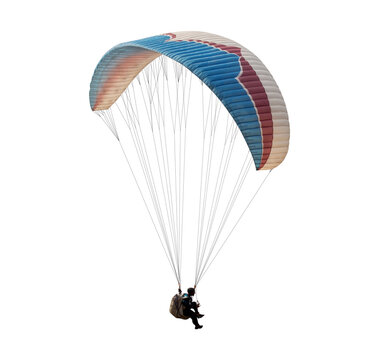 The sportsman flying on a paraglider. isolated on transparent background with clipping path. Beautiful paraglider in flight  with clipping path and alpha channel. for both printing and web pages. 
