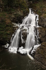Partially-frozen Sitting Lady Falls at Witty's Lagoon in Metchosin, BC