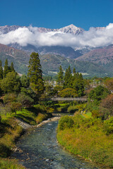 Fototapeta na wymiar 長野県 大出公園から眺める北アルプスと秋景色