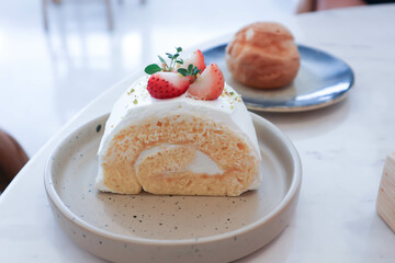 roll , cake roll or Swiss roll with strawberry