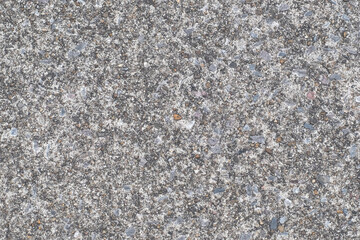 Small stones flooring texture or road stone background.