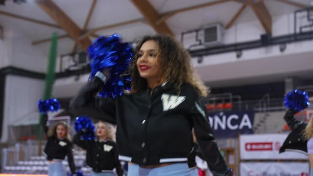go girls lets support our team, cheerleaders dancing in the arena. High quality 4k footage