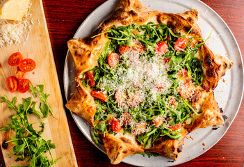 Pizza. Cheese Pizza. Traditional New York City style margarita pizza pie with a thin homemade crispy crust, tomato, garlic, marinara sauce topped with buffalo mozzarella cheese and fresh basil leaves.