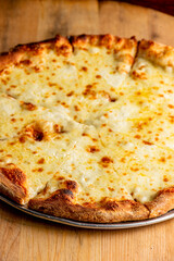 Pizza. Cheese Pizza. Traditional New York City style margarita pizza pie with a thin homemade crispy crust, tomato, garlic, marinara sauce topped with buffalo mozzarella cheese and fresh basil leaves.