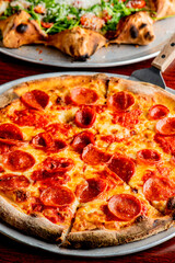Pizza. Cheese Pizza. Traditional New York City style margarita pizza pie with a thin homemade crispy crust, tomato, garlic, marinara sauce topped with buffalo mozzarella cheese and fresh basil leaves.
