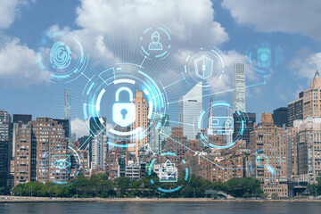 New York City skyline from Roosevelt Island over the East river towards skyscrapers of Midtown Manhattan, day time. The concept of cyber security to protect confidential information, padlock hologram