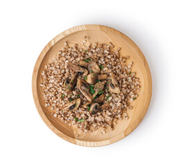 Wooden plate of tasty buckwheat porridge with mushrooms and dill isolated on white background