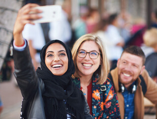 Friends selfie, muslim woman and city with smile, man and happiness with smartphone on social...