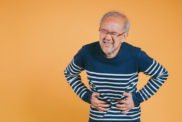 Asian Senior man feel stomachache. Older mature male touch belly. Bowel problem health care and...