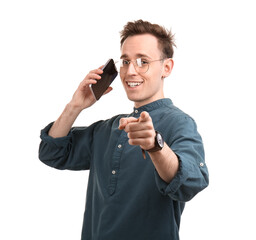 Cool young man talking by phone on white background