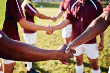 Man, sports and handshake for team introduction, greeting or sportsmanship on the grass field...