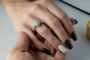 Hand with diamond ring