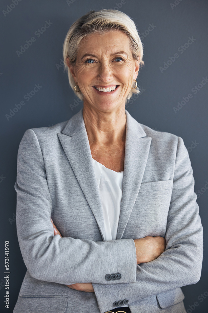 Poster Smile, confidence and portrait of mature businesswoman with arms crossed isolated on blue background. Success, vision and leadership, happy senior woman in corporate management standing in studio.