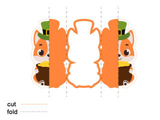 Cute dog in green leprechaun hat holds bowler with gold coins. Irish holiday folklore theme. Fold long greeting card template. Printable color scheme. Print, cut out, fold. Vector illustration