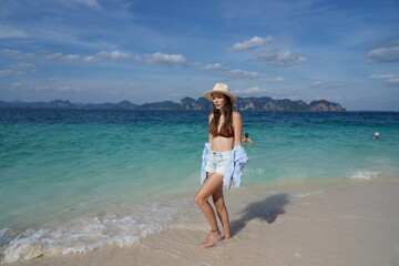Fototapeta premium woman on the beach in krabi thailand, poda island, model shooting
