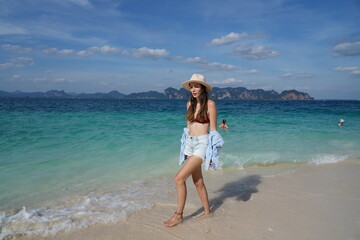 Fototapeta premium woman on the beach in krabi thailand, poda island, model shooting