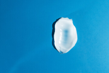 cream texture hyaluronic on a blue background