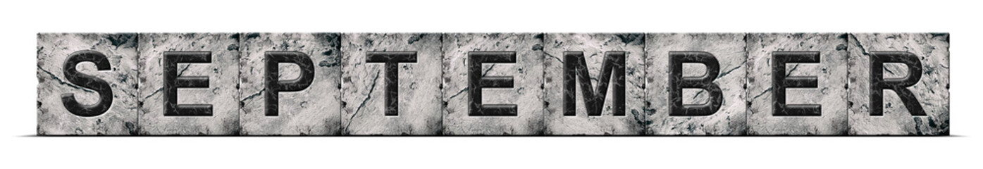 September, word on an alphabet on stone blocks, isolated on white background. Month of the year concept.