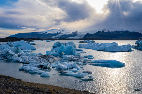 Sun setting over Jokulsarlon glacial lagoon in Vatnajokull National Park Iceland