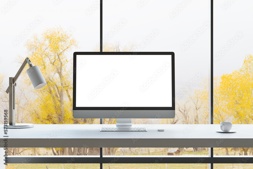 Poster Front view on blank white modern computer monitor with space for your logo or text on light work surface with lamp and coffee mug and autumn trees background from big window. 3D rendering