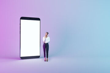 Online, digital and mobile application concept with pensive woman near huge modern smartphone with blank white screen and space for web design or landing page on abstract colorful background, mock up