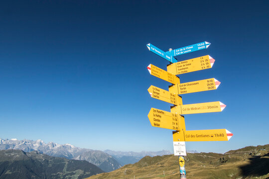 Trail post showing directions in Swiss Alps, Haute Route, Valais Canton, Switzerland