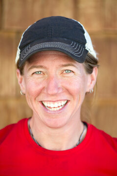 A portrait of a smiling woman, just after finishing her fastpack of 170 miles around the Tahoe Rim Trail in just six days, NV.