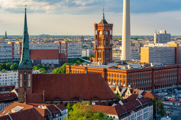 Saint Mary's church (St. Marienkirche) and Red Town Hall (Rotes Rathaus) on Alexanderplatz square,...
