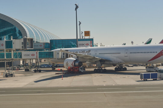 DUBAI, UAE - CIRCA NOVEMBER, 2015: Emirates aircraft on tarmac at Dubai International Airport.