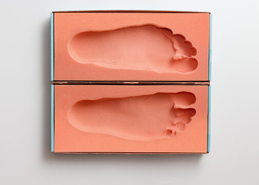 Orthopedic foam footprints or mold measurement from block to create custom made orthotics or orthopedic insoles