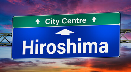 Road sign indicating direction to the city of Hiroshima