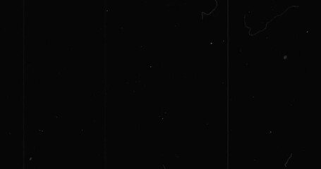 Old film grunge on black background realistic flickering, light leaks, dirt, grain, scratches, overlays, vintage effect.