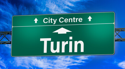 Road sign indicating direction to the city of Turin