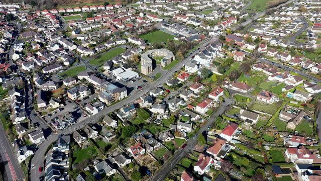 Aerial footage of the town of Deganwy in Conwy County Borough in Wales It lies in the Creuddyn Peninsula alongside Llandudno Rhos-on-Sea showing residential housing estates in the town.