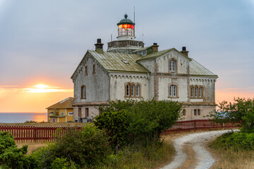 Stone lighthouse building in summer afternoon sun on Stora Karlso. Gotland, Sweden