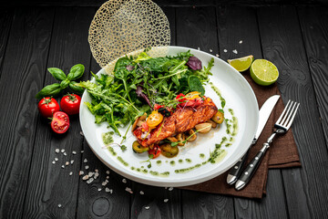 Grilled salmon fillet with vegetables mix.