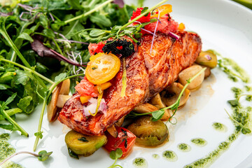 Grilled salmon fillet with vegetables mix.