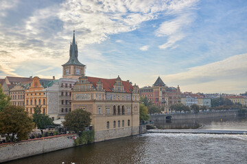 Fototapeta na wymiar The bank of the Vltava flows through the town of Prague.