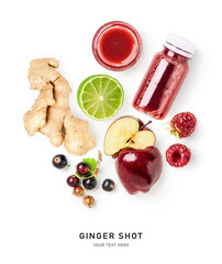 Ginger shot bottle and fresh red fruits isolated on white background.