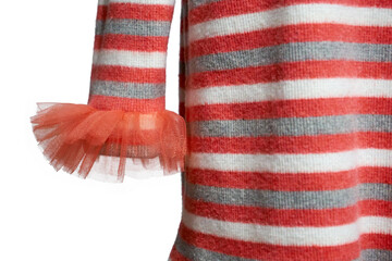 Part of the striped dress is white, orange and gray. Dress on a white background. Selective focus