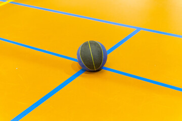 Basketball ball on a basketball court