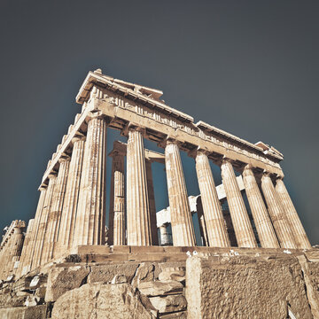Parthenon, the famous ancient Greek temple on the acropolis of Athens, Greece. Cultural travel in Greece. Filtered image.