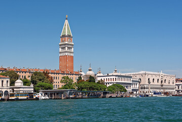 Fototapeta na wymiar Grand Canal with St Marks Campanile bell tower and St Marks Basilica in the Piazza San Marco in Venice, Italy