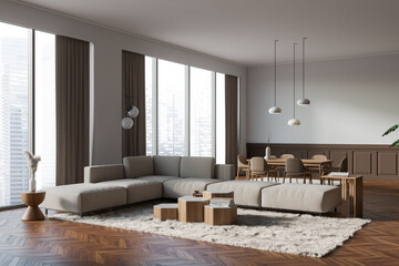 Corner view on bright living room interior with panoramic window