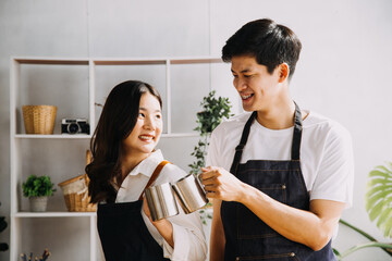 In Kitchen: Perfectly Happy Couple Preparing Healthy Food, Lots of Vegetables. Man Juggles with Fruits, Makes Her Girlfriend Laugh. Lovely People in Love Have Fun