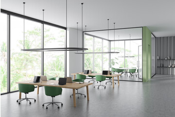 Office interior with meeting room and workspace near panoramic window