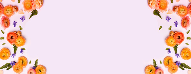 Composition of Purple Hyacinth and Yellow Buttercups on Light pink Background. Holiday banner, copy space. Valentines Day, Mothers day, birthday or arrangement concept.