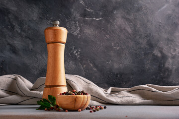 Hot spices, parsley leaves with pepper mill for tasty cooking - obrazy, fototapety, plakaty